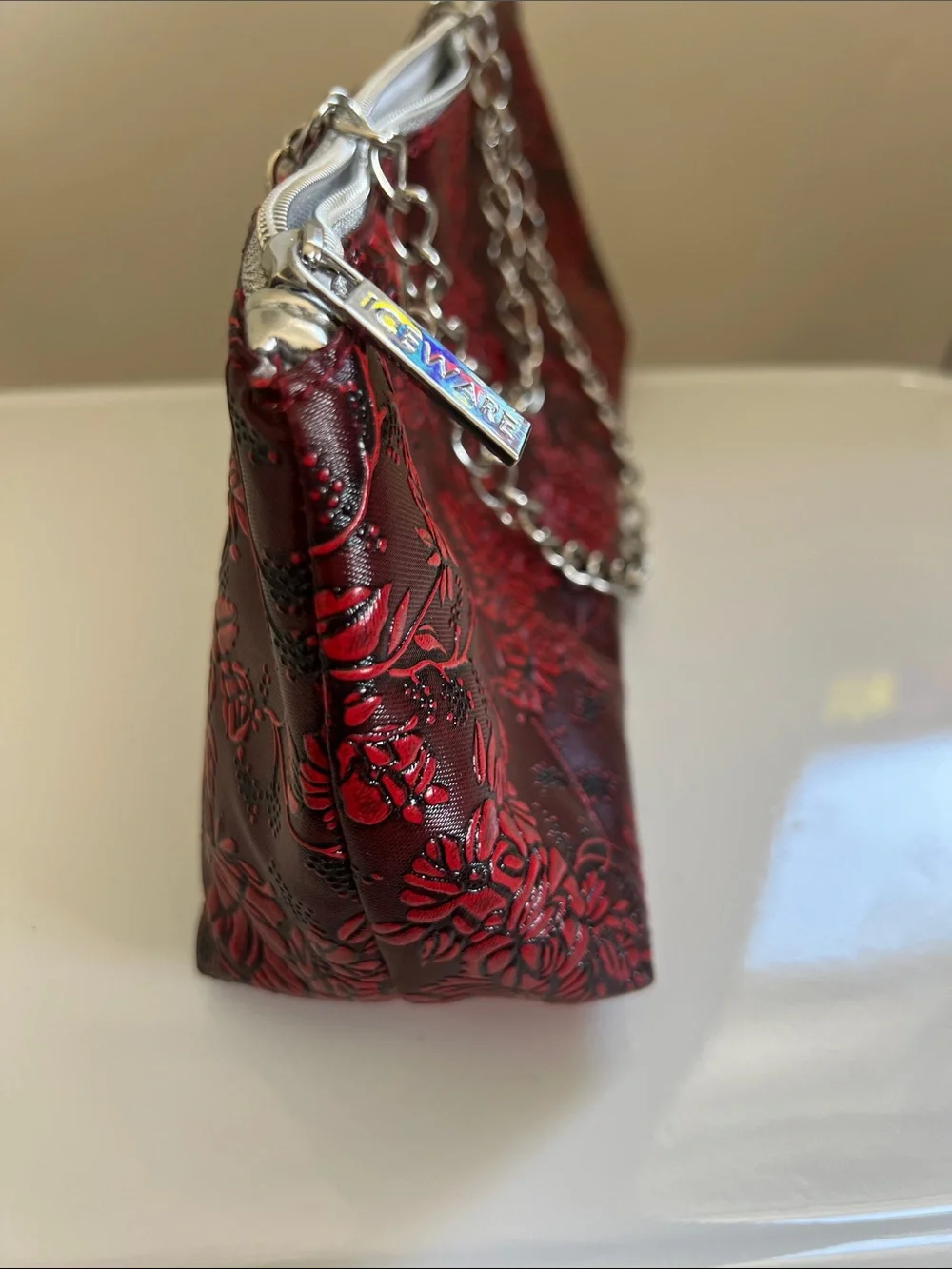 Iceware Red Floral Embossed Chain-Handle Clutch.